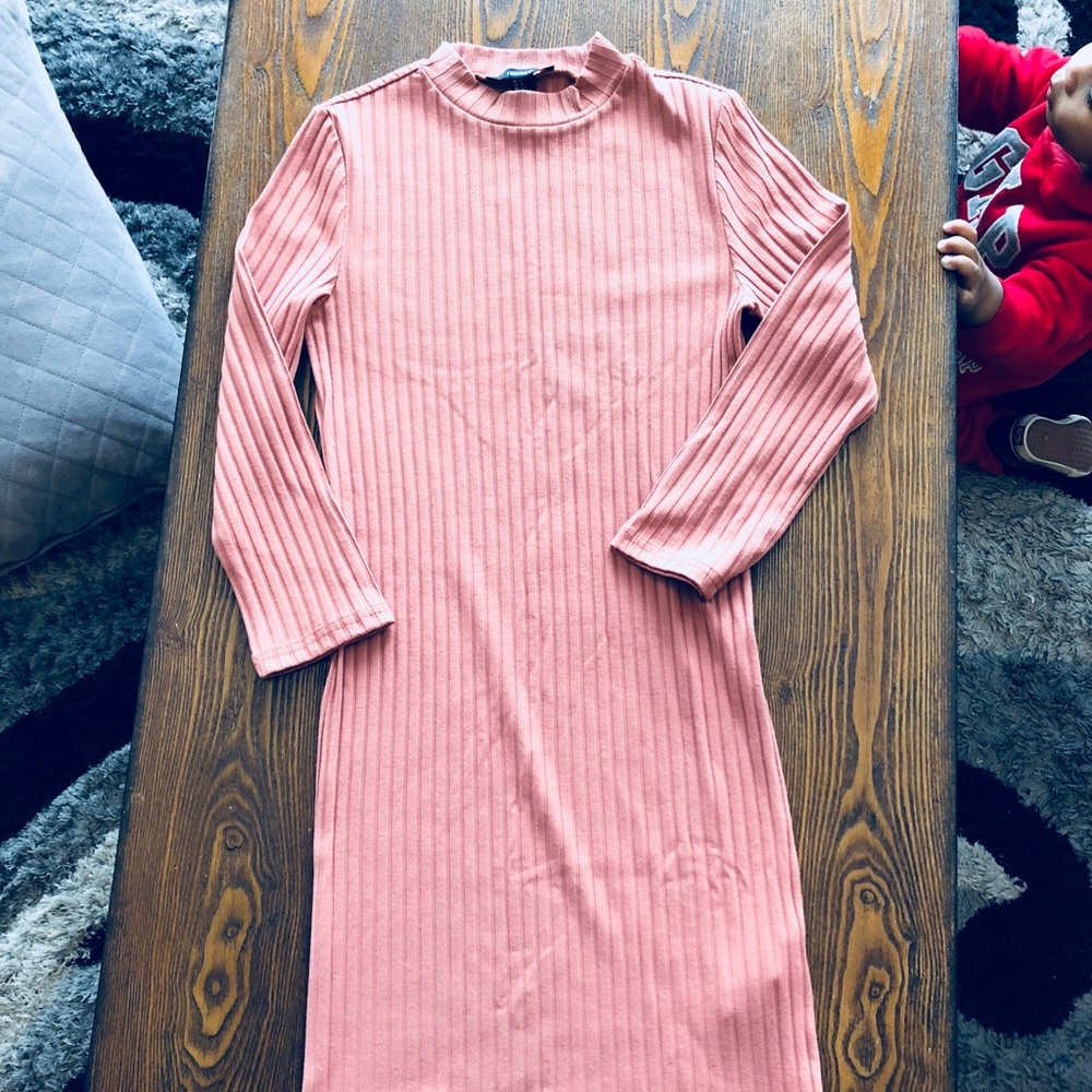 Pink knitted bodycon turtleneck dress
